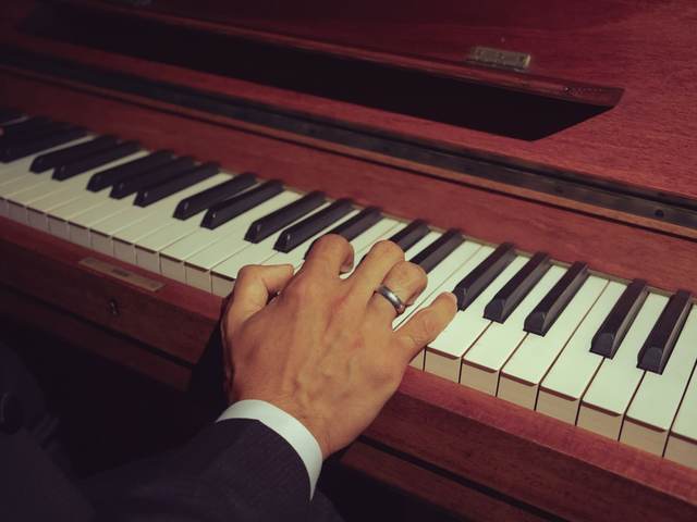 A musician playing the piano