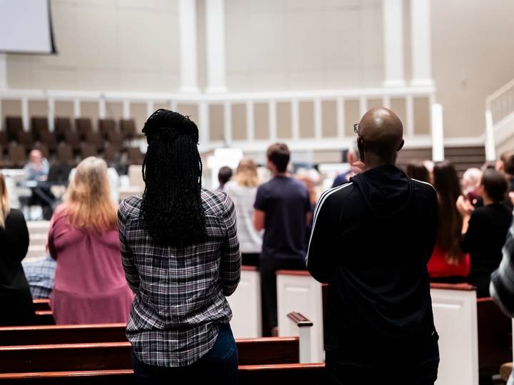 People standing together during a church service